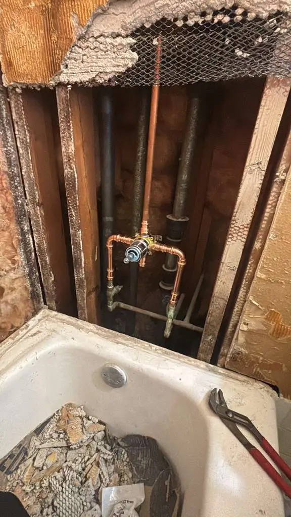 Updated copper bathtub plumbing after repair
